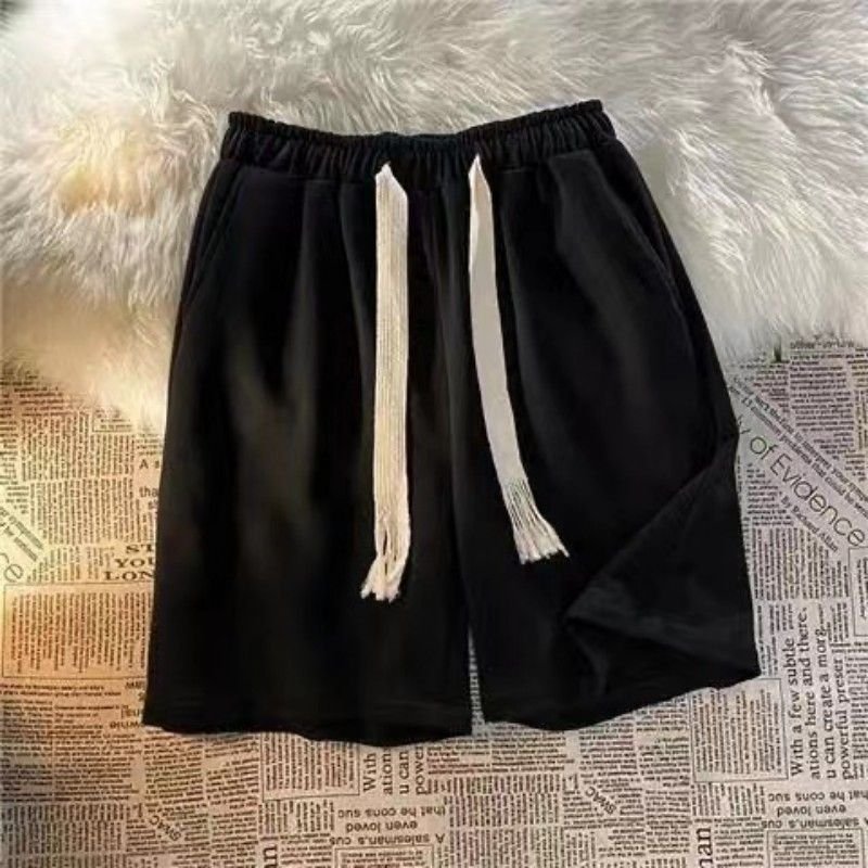 Men Simple Casual Solid Color Loose Drawstring Shorts