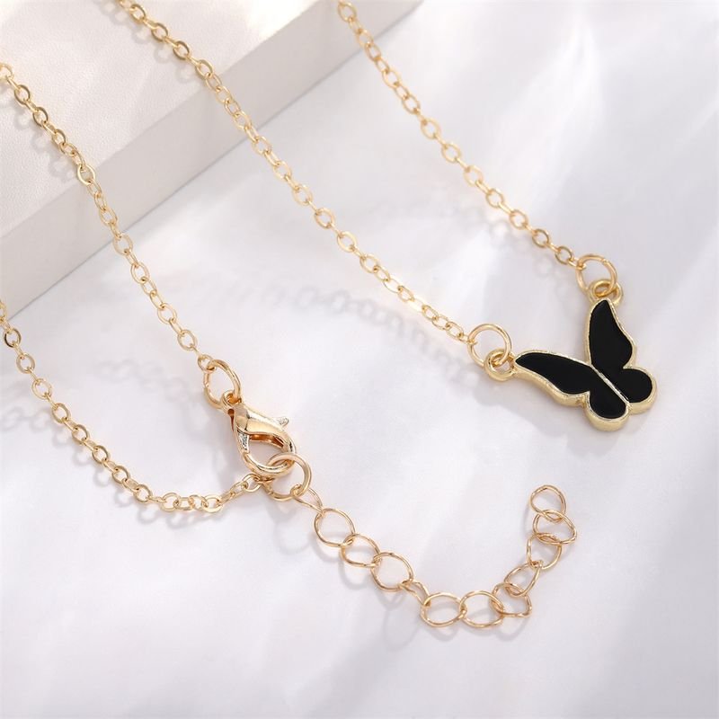 Women Simple Fashion Dropping Oil Butterfly Necklace Earrings Bracelet Ring Four-Piece Set