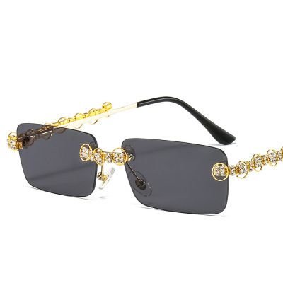 Women Fashion Frameless Marine Leaf Spring Leg Sunglasses